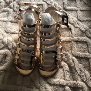 Gold heels and gold hoop earrings